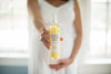 Pregnant Model holding Milk and Honey Oil